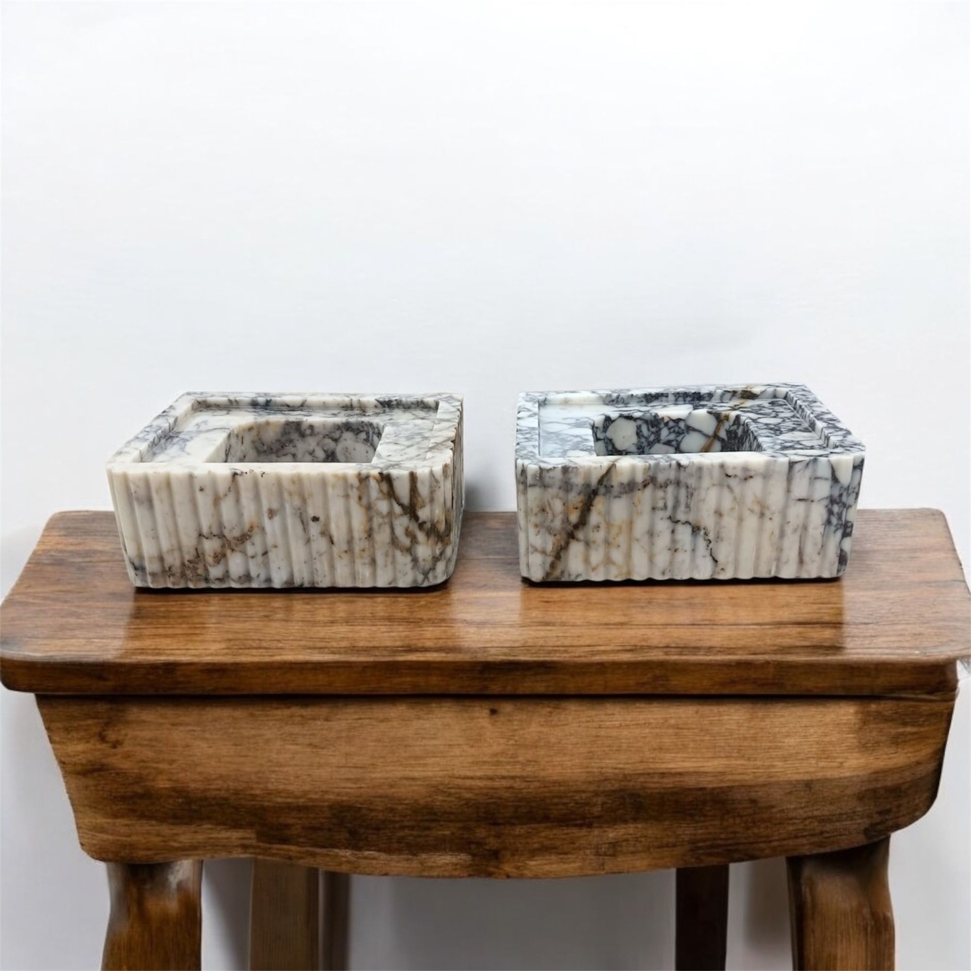 🔥 Custom Calacatta Marble Double Sink – Luxury Meets Design Hand-carved from a single block of real Calacatta marble, this stunning double sink set features bamboo-style detailing and works as both a wall-mounted or countertop installation. Perfect for luxury bathrooms, yachts, hotels, cafes, and modern interiors.  📐 15.75" x 11.81" x 5.91" – Approx. 30kg each 📦 Ships worldwide in insured wooden crates 🎯 Fully customizable to your design vision  🛒 Order yours now 👉 https://marblesinkco.etsy.com/listing/1893484437/calacatta-marble-double-sink-set-hand