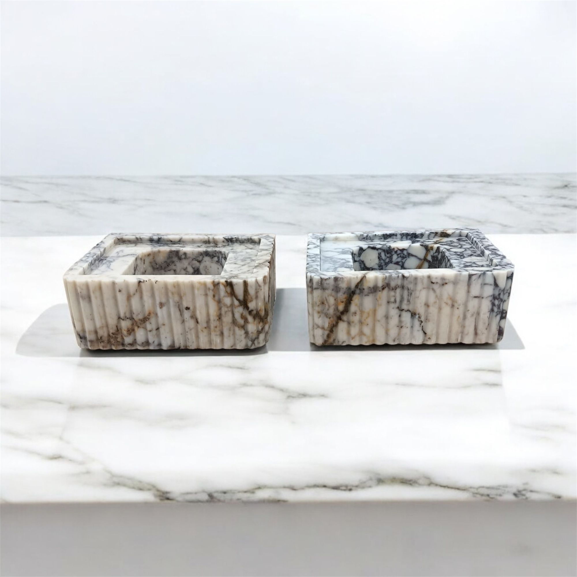 🔥 Custom Calacatta Marble Double Sink – Luxury Meets Design Hand-carved from a single block of real Calacatta marble, this stunning double sink set features bamboo-style detailing and works as both a wall-mounted or countertop installation. Perfect for luxury bathrooms, yachts, hotels, cafes, and modern interiors.  📐 15.75" x 11.81" x 5.91" – Approx. 30kg each 📦 Ships worldwide in insured wooden crates 🎯 Fully customizable to your design vision  🛒 Order yours now 👉 https://marblesinkco.etsy.com/listing/1893484437/calacatta-marble-double-sink-set-hand