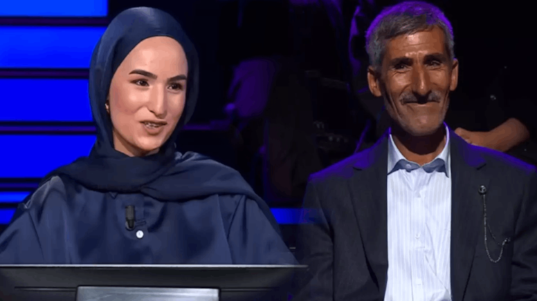 S�nav ��k��� �i�eklerle Kar��layan Baba, Yar��ma Program�nda da K�z�n�n Arkas�nda Durdu